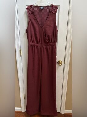 Bebe Woman’s Sleeveless Jumpsuit in Deep Burgundy w/ metal detail, Size L, NWOT